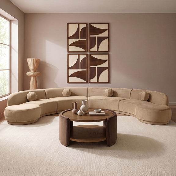 Beige velvet sectional sofa with rounded chaise and plush cushions