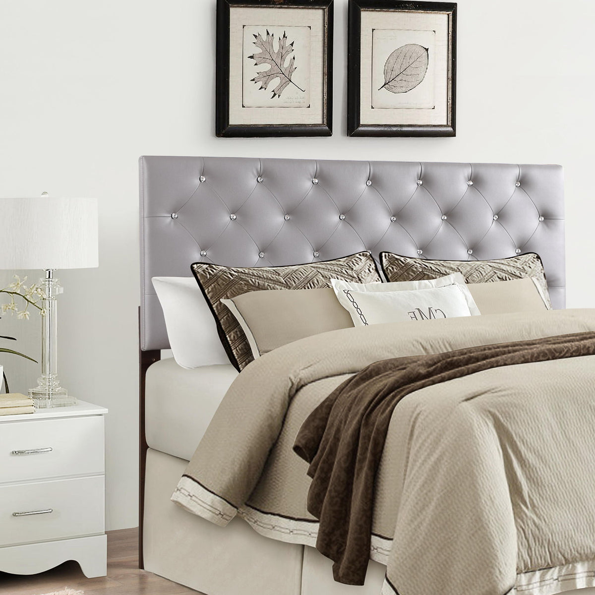 Pearl silver tufted headboard with diamond buttons, framed by four dark wooden legs
