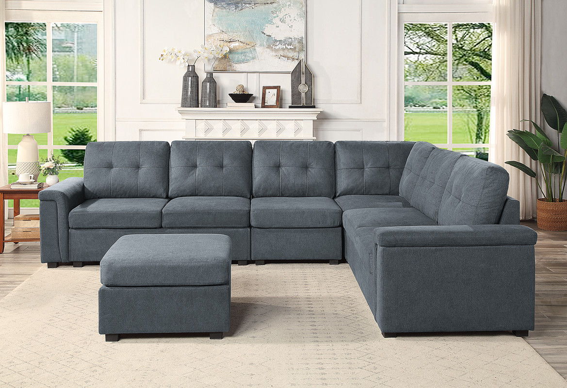 Dark gray fabric sectional sofa with chaise corner and matching ottoman