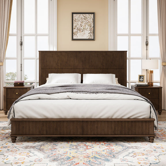 Dark brown upholstered bed with slatted base, white bedding, and two side nightstands