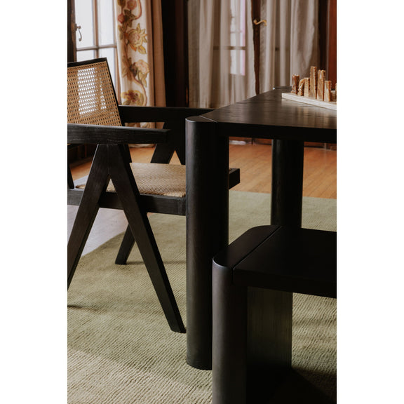 Black dining bench corner view with smooth legs and flat seat