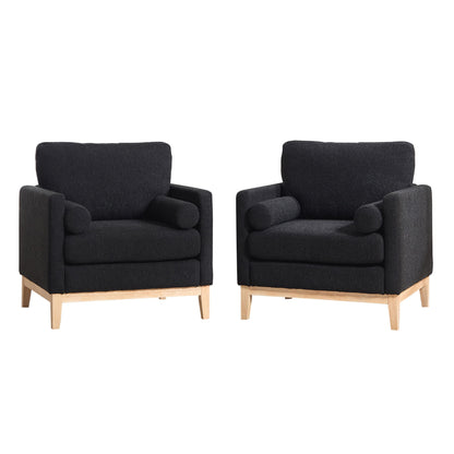 Black fabric accent chair with wide armrests and natural wood legs