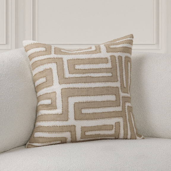 Mateo pillow with tan geometric maze embroidery on light natural fabric