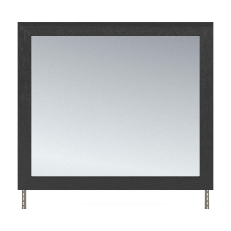 Black bedroom mirror with dark wood frame and two standing legs
