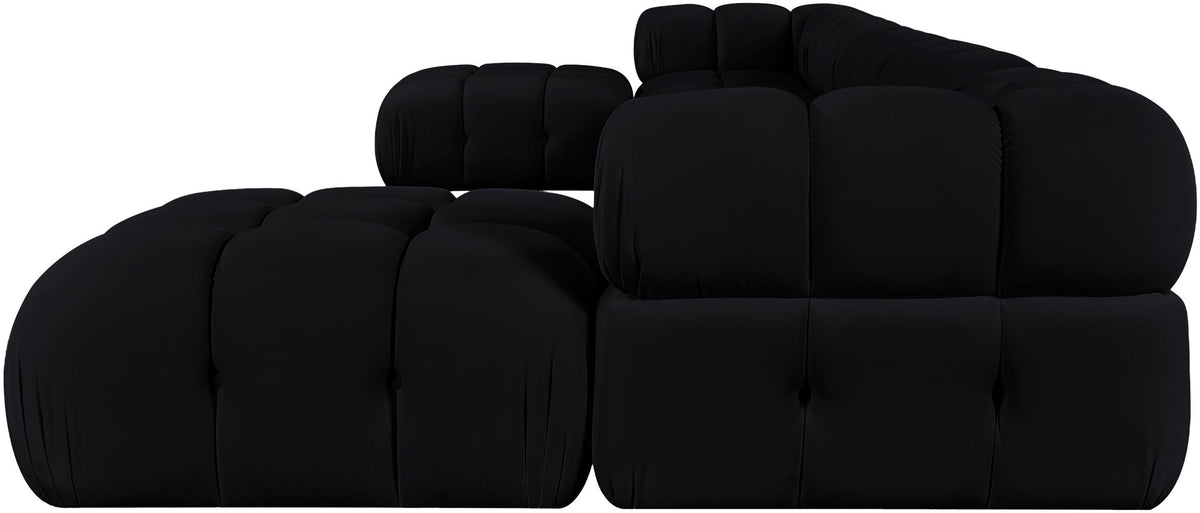 Black modular sectional sofa with tufted, rounded back cushions and seat modules