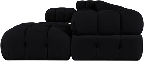 Black modular sectional sofa with tufted, rounded back cushions and seat modules