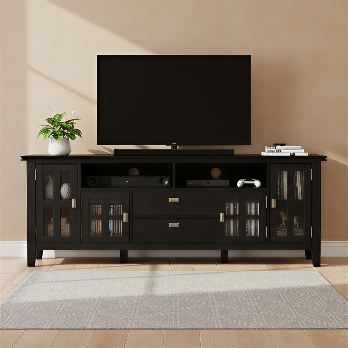 Black TV media stand with open media shelf, drawers, and glass-front side cabinets