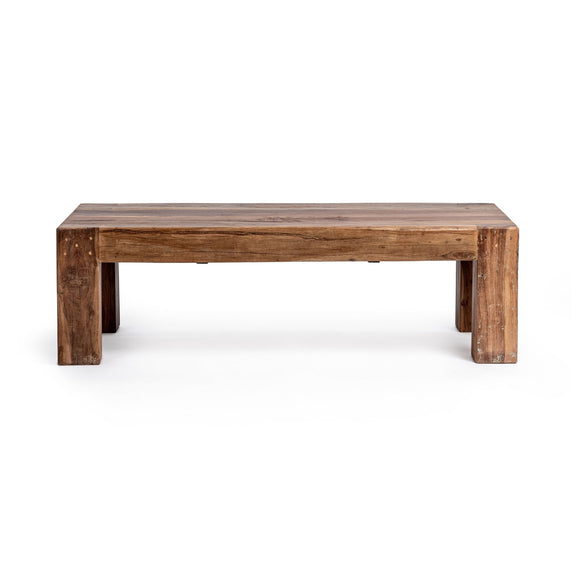 Distressed wooden table with rectangular top and short block legs