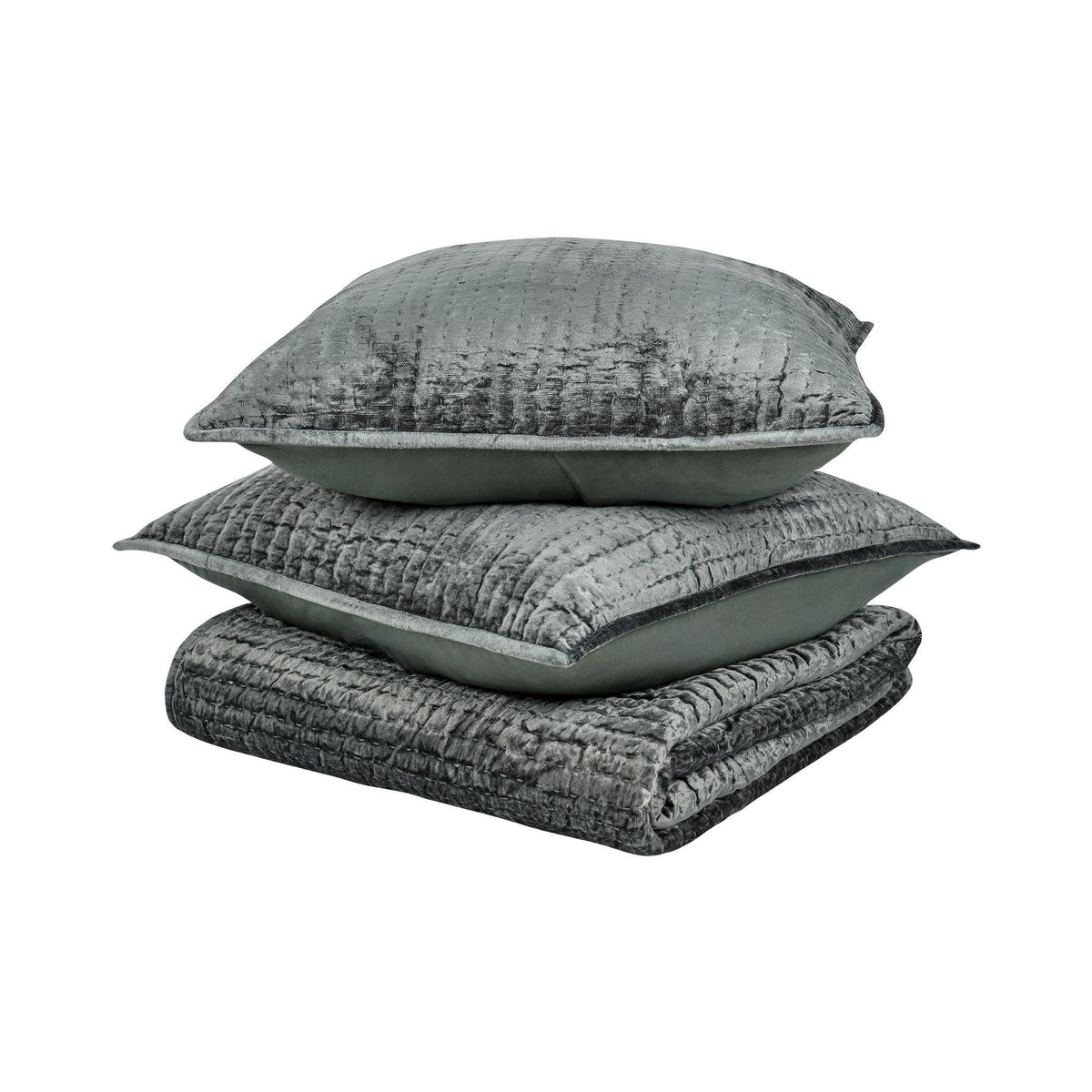 Stacked gray velvet pillow covers