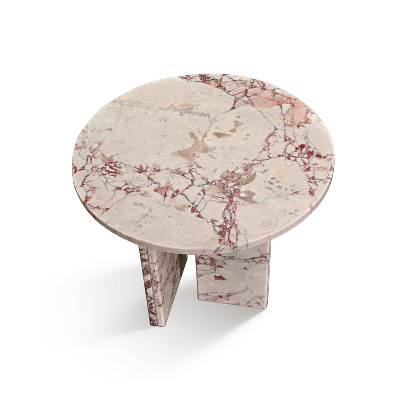 Beige round stone coffee table with red veining and angular block base
