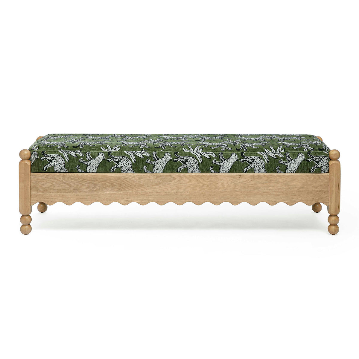 Green leopard jacquard upholstered bench with scalloped skirt and wooden legs