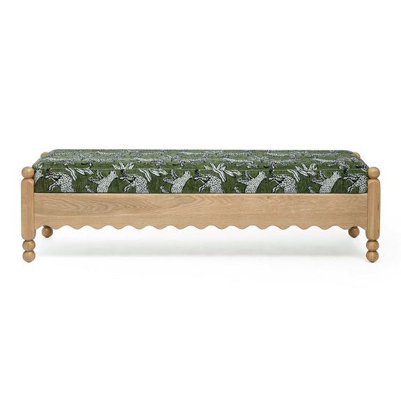 Green leopard jacquard upholstered bench with scalloped skirt and wooden legs