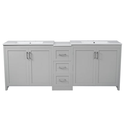 White double-sink bathroom vanity with quartz countertop, two side cabinet doors, center drawer.