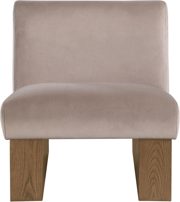 Velvet accent chair with taupe fabric and walnut-toned wooden legs, rounded seat.