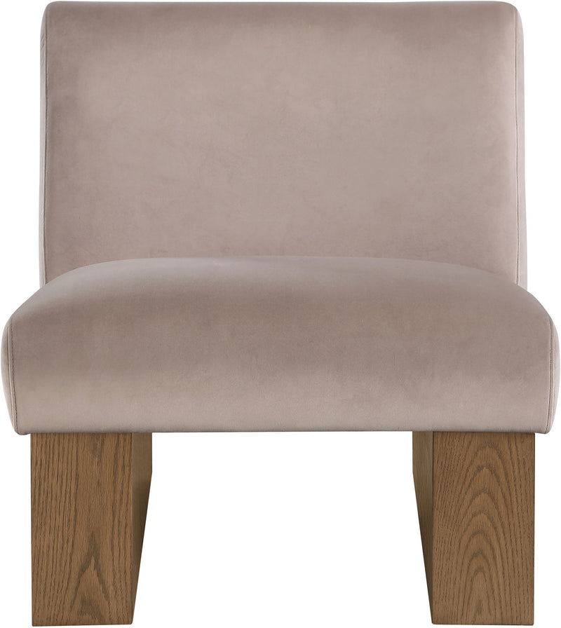 Velvet accent chair with taupe fabric and walnut-toned wooden legs, rounded seat.