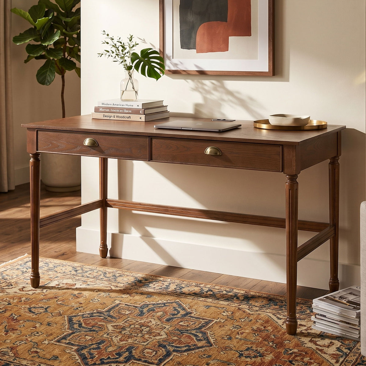 Dark brown writing desk with two drawers, brass-tone pulls, and lower shelf