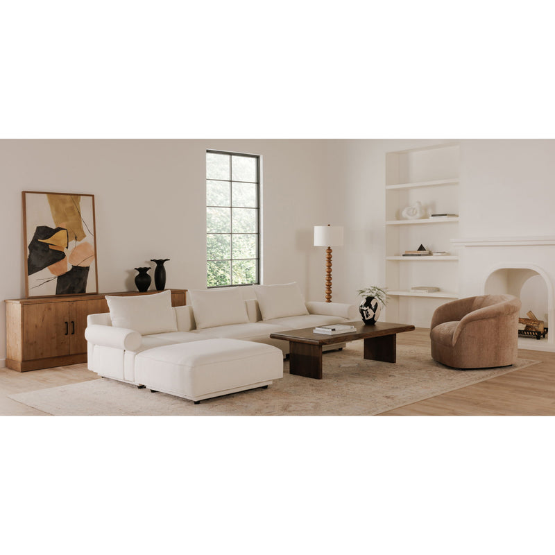 Brown wooden coffee table centered in living room with sofa and armchair