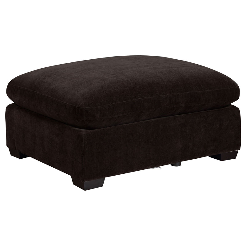 Black upholstered ottoman with square base and thick round padded top.