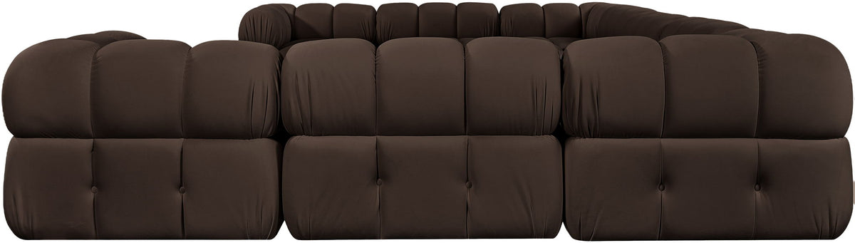 Dark brown velvet sectional with tufted cushions and curved corner modules