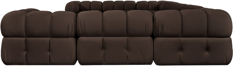 Dark brown velvet sectional with tufted cushions and curved corner modules