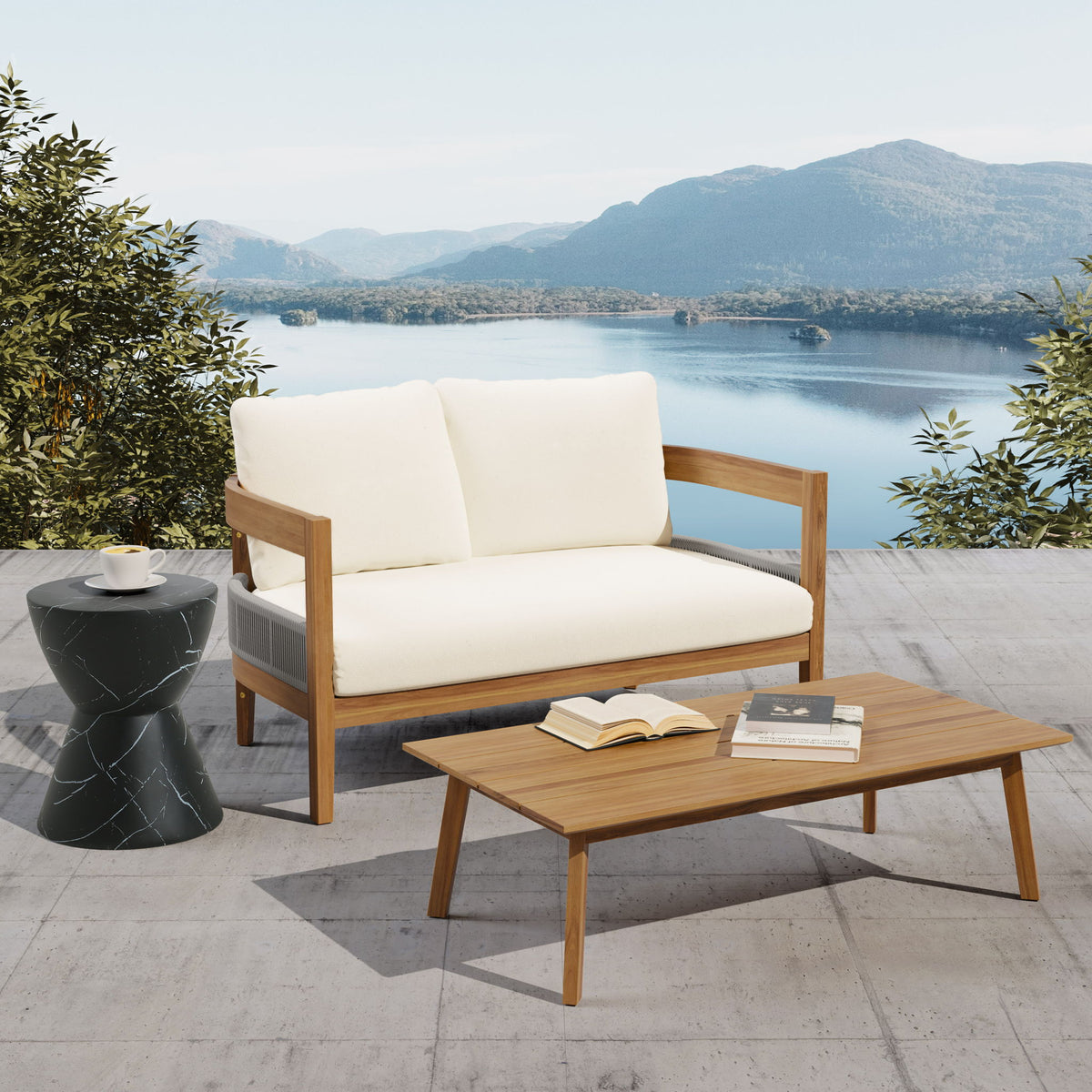 Outdoor loveseat with beige cushions and teak frame, plus wooden coffee table
