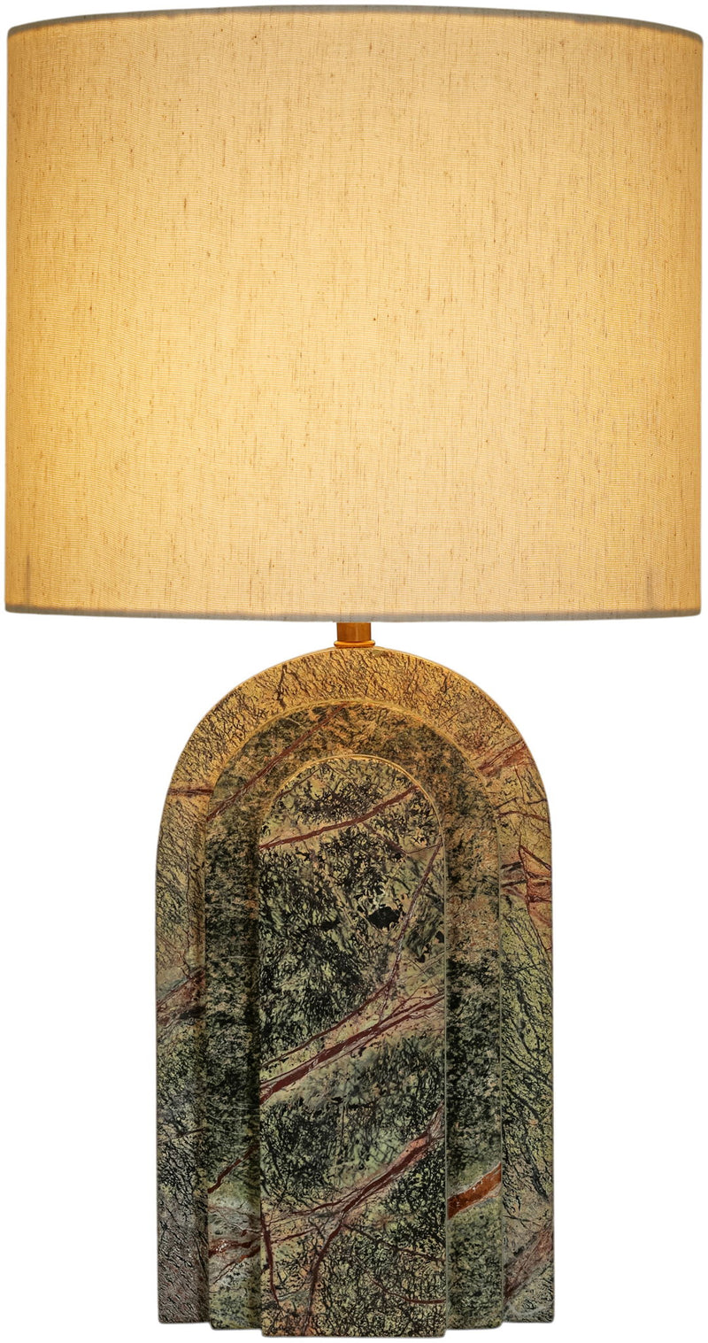 Table lamp with tan fabric shade and green textured stone arch base