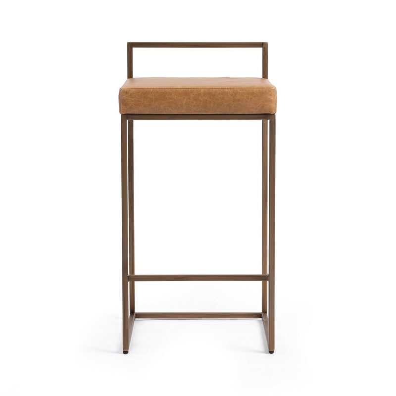 Chestnut counter stool with tan upholstered seat and light wood-tone frame, backless