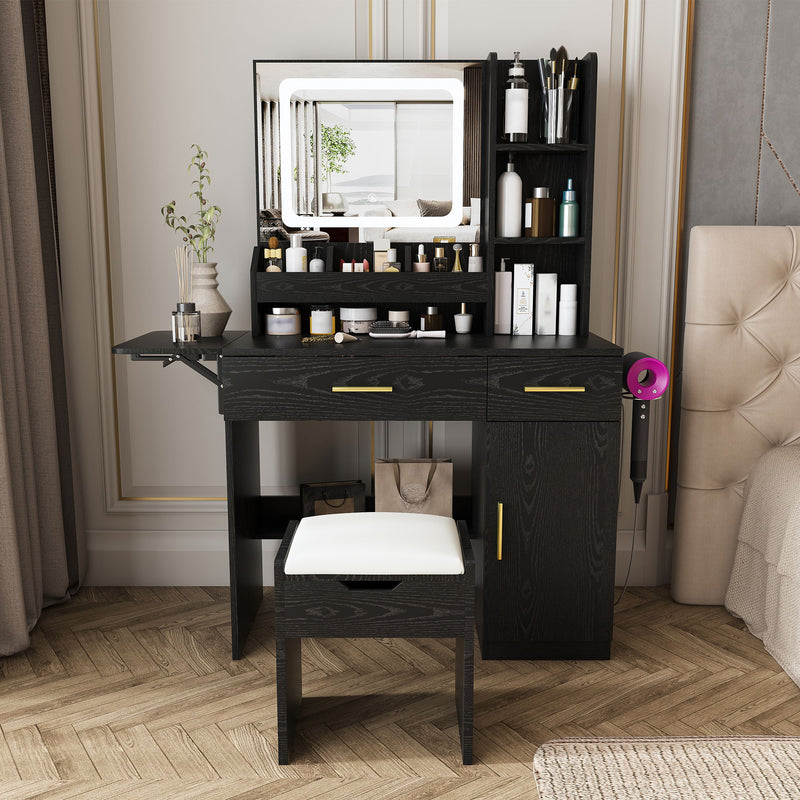 Black vanity desk with LED mirror, cosmetic storage shelves, drawers, cabinet, and matching stool