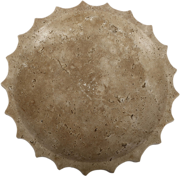 Beige travertine bowl with speckled surface and scalloped rim edge.