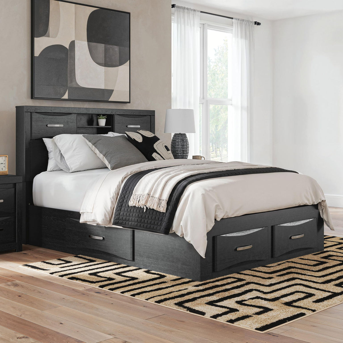 Black queen bed with bookcase headboard and storage drawers beneath, styled with bedding