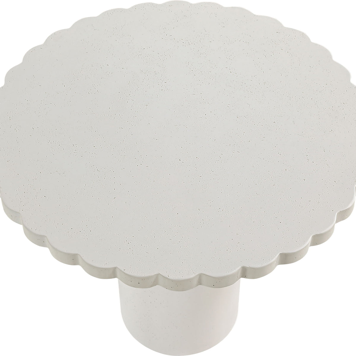 Indoor/outdoor table with round scalloped top and white pedestal base