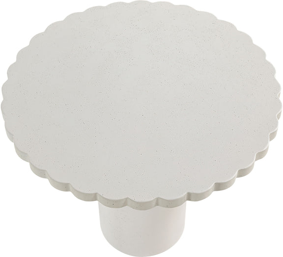 Indoor/outdoor table with round scalloped top and white pedestal base