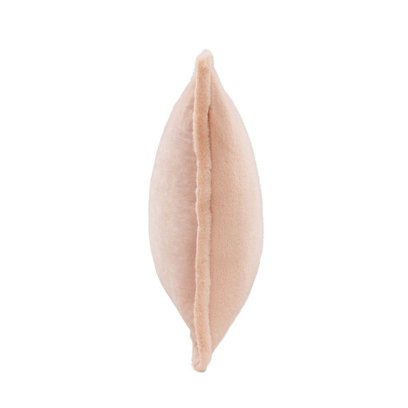 Peach plush pillow with visible side seam and stuffed look