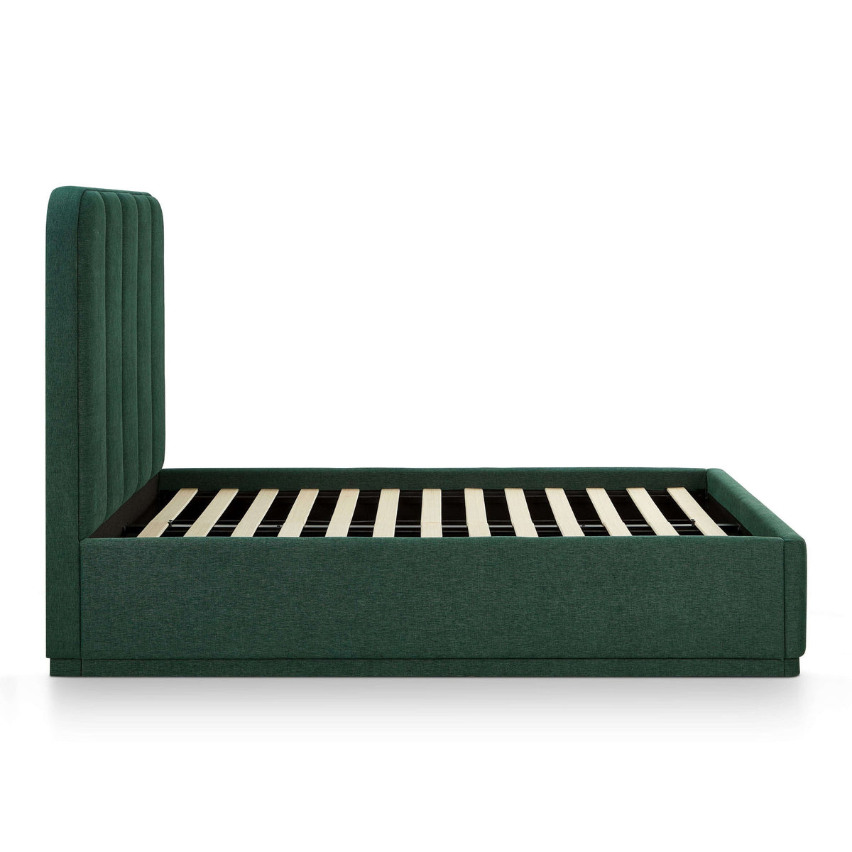 Dark green upholstered bed with slatted base, side rail, and tall paneled headboard.