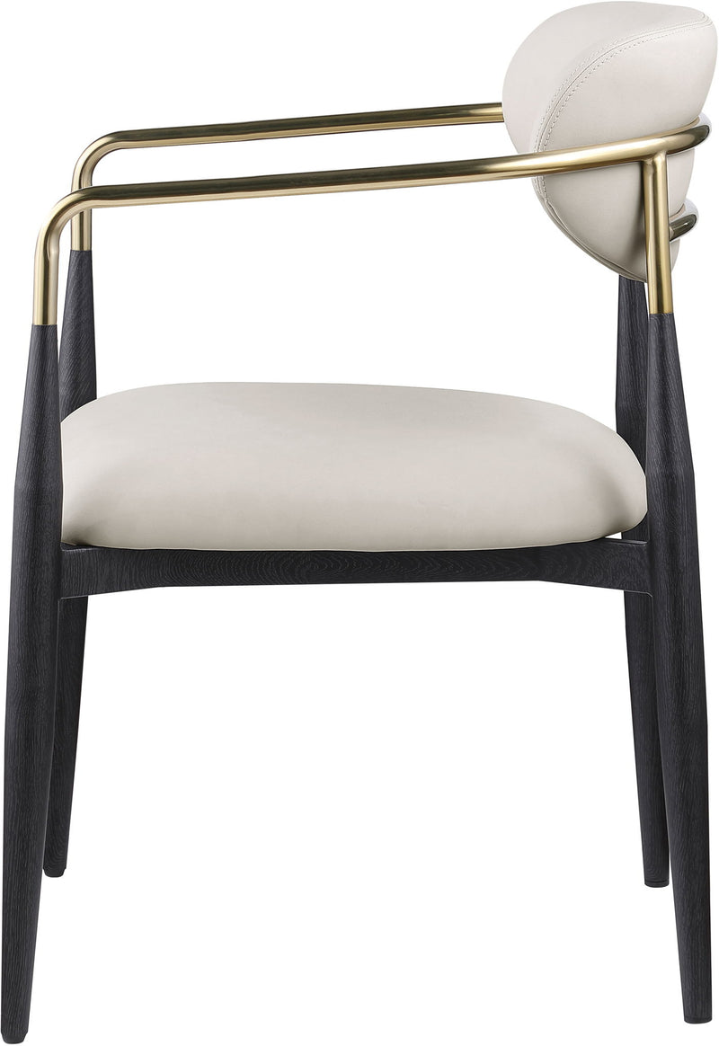 Upholstered dining arm chair with light gray seat and back, black legs, gold arm frame