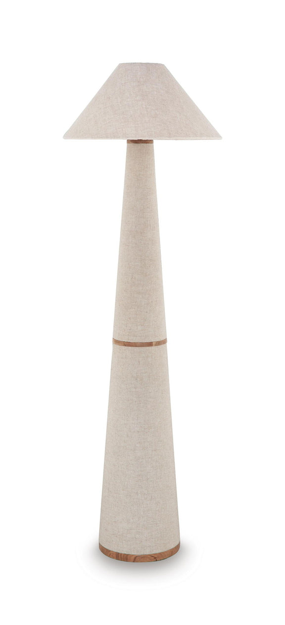 Beige fabric lampshade on slender metal table lamp with wood-tone base ring