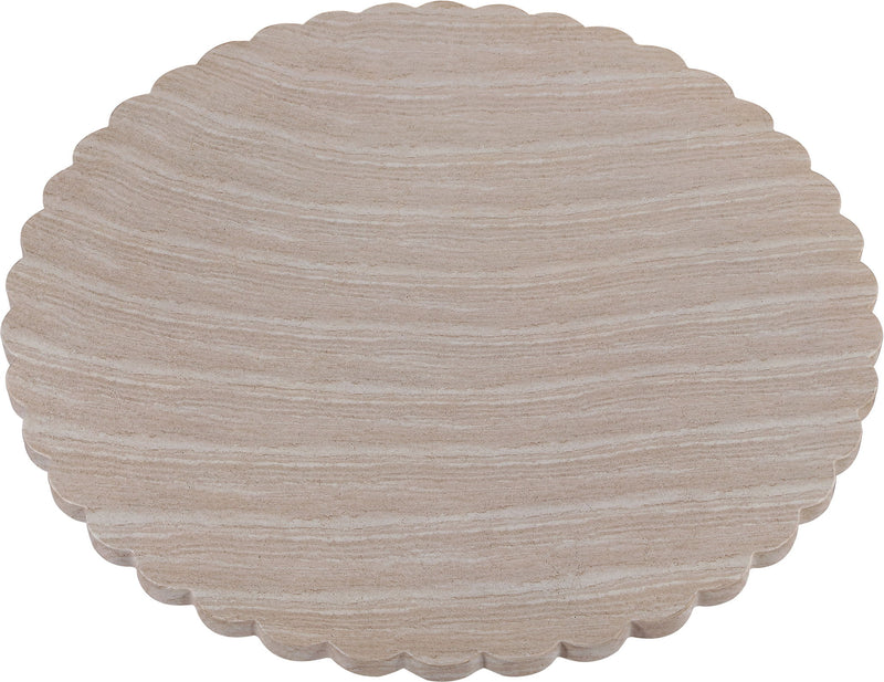 Indoor/outdoor table with round scalloped top and beige pedestal base
