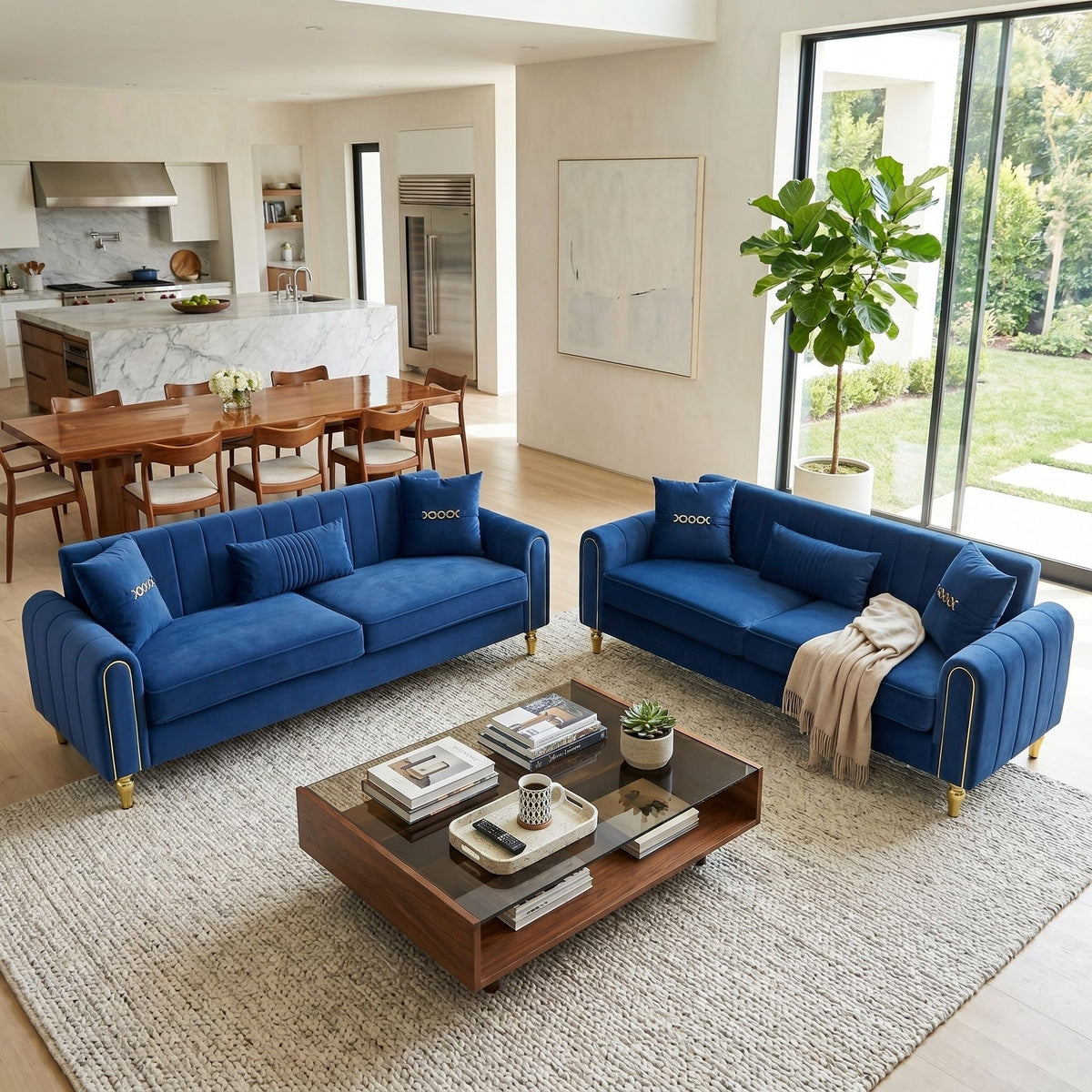 Blue three-seat sofa set with plush cushions, channel-tufted arms, and gold-tone feet