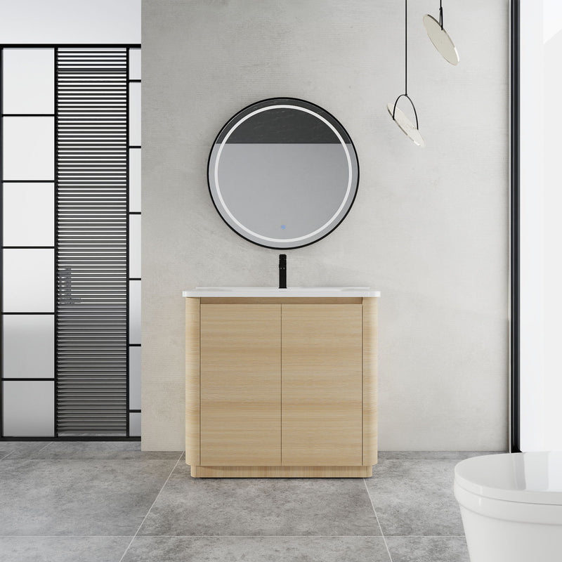 Freestanding bathroom vanity with white sink top and light brown two-door cabinet