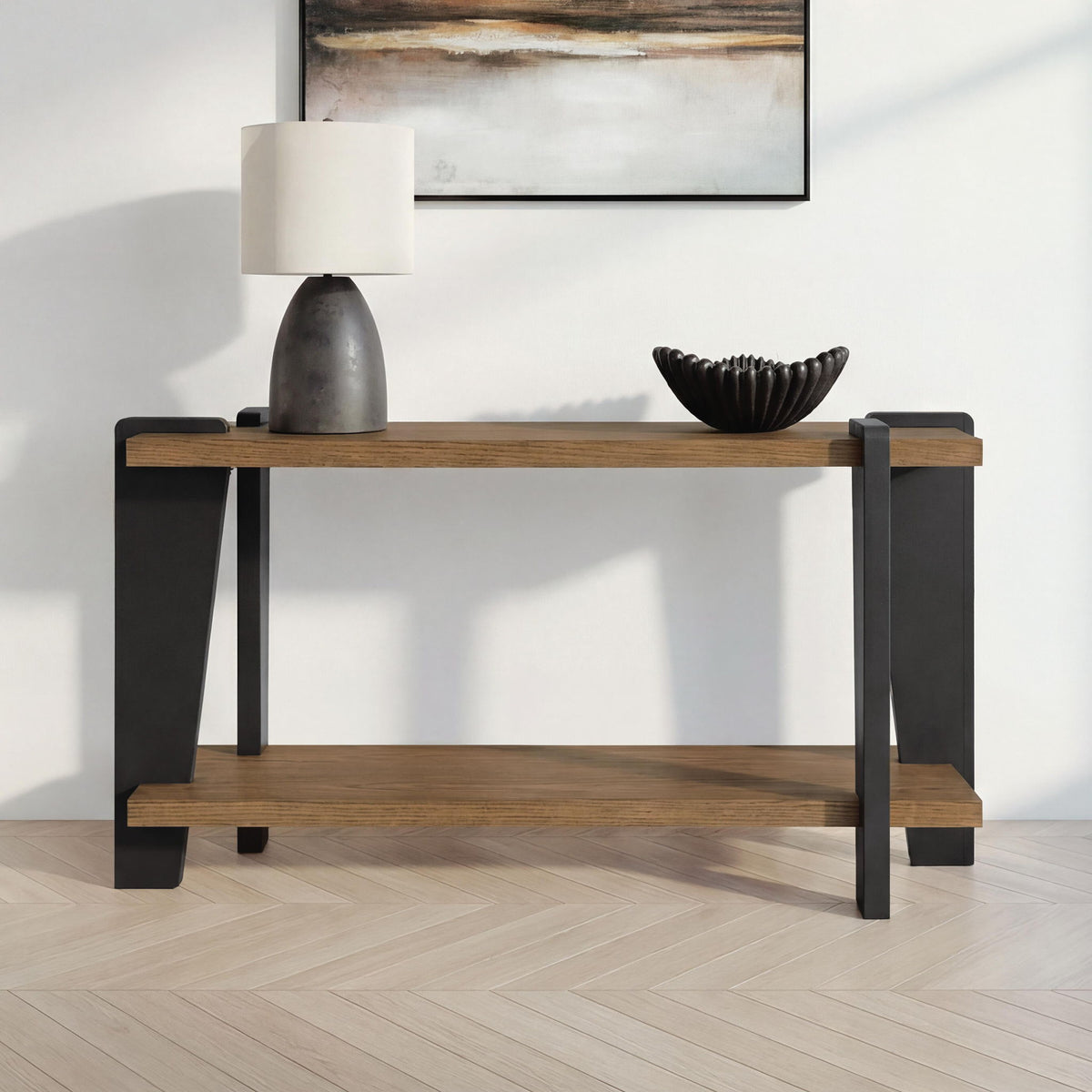 Rectangular table with dark wood top, black legs, and lower shelf for decor