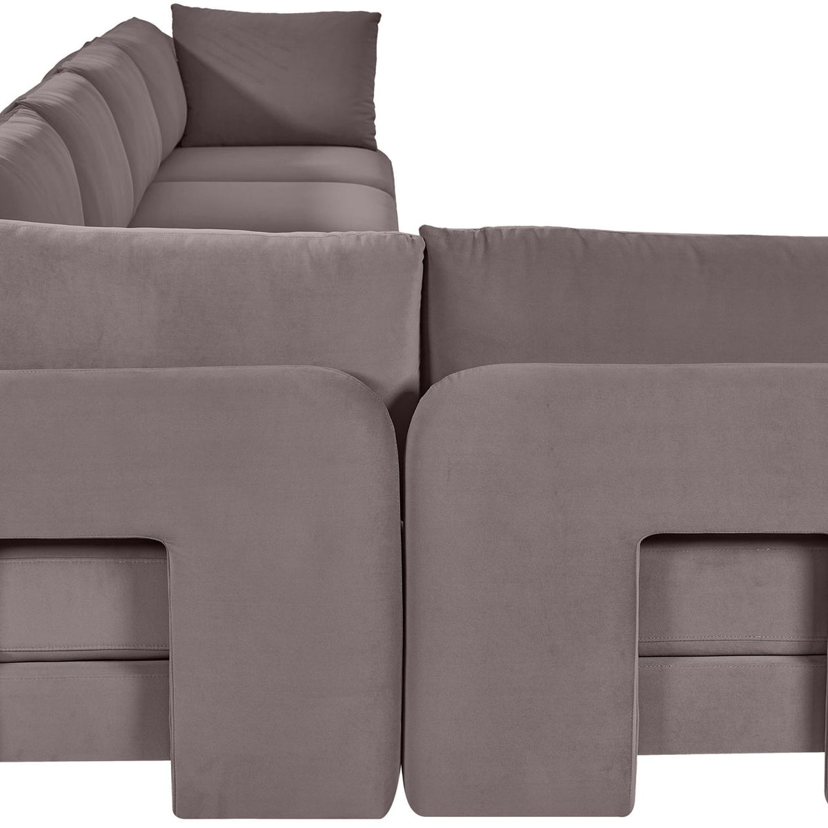 Taupe armless sectional sofa with square panel detailing and plush back pillows