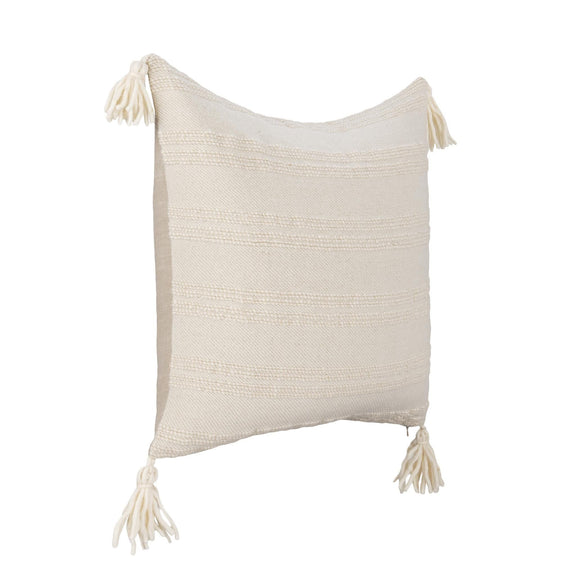 Natural pillow front panel with tassels at top corners and relaxed square shape