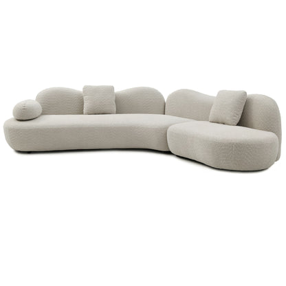 Beige curved modular 5-seater sofa with rounded arms and three seat cushions