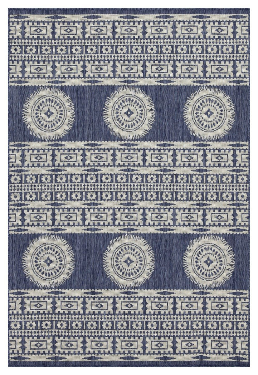 Navy and white polypropylene area rug with circular medallion and repeating border pattern
