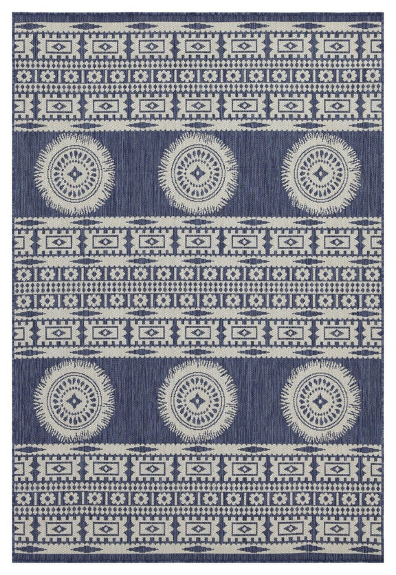Navy and white polypropylene area rug with circular medallion and repeating border pattern