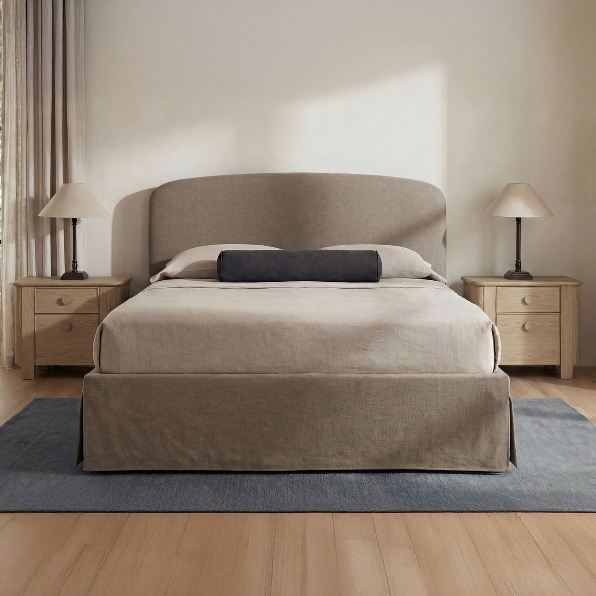 Light taupe king upholstered bed with tall headboard and low platform base