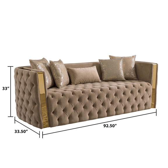 Taupe button-tufted sofa with gold-tone arms, 4 pillows, and size markings