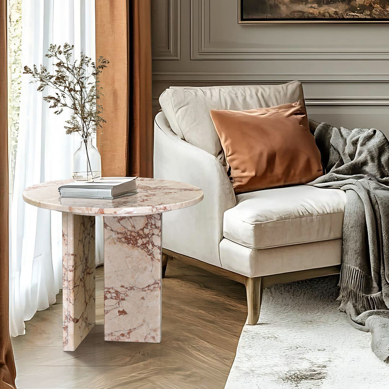 Marble-look round coffee table with beige base and red veining, square cut pedestal legs