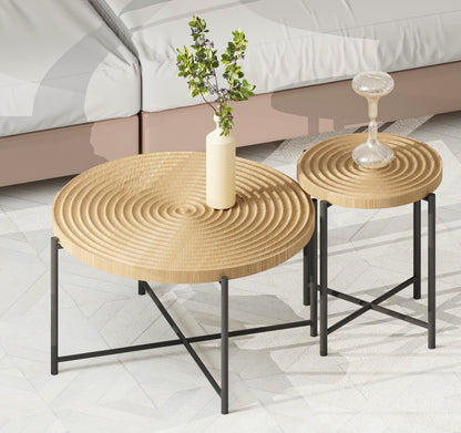 Set of 2 round wicker coffee end tables with distressed light-brown tops and black metal legs