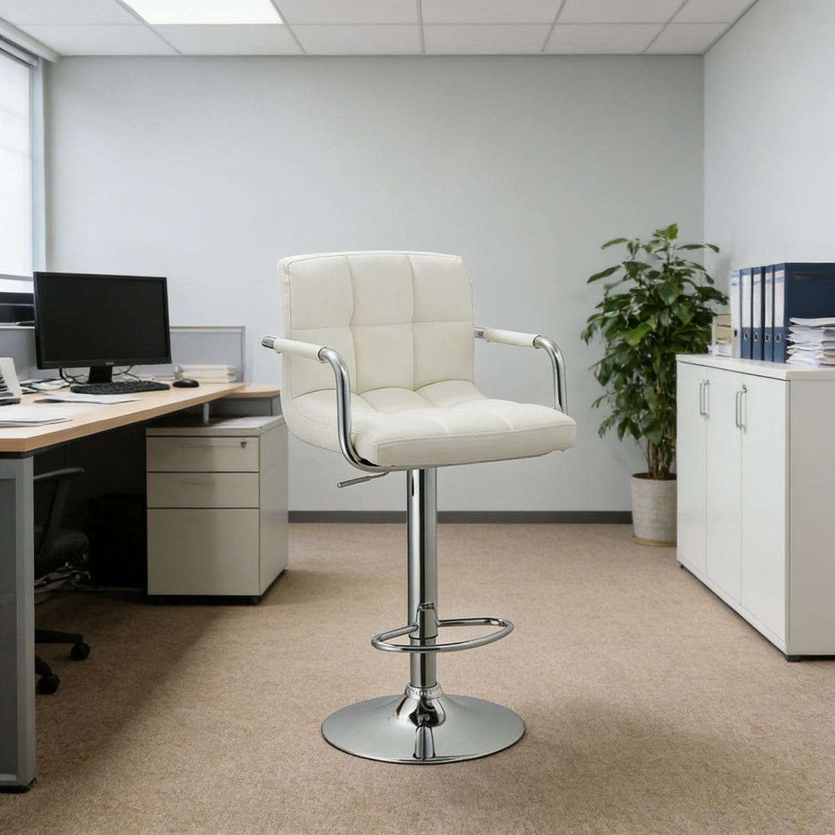 White cushioned swivel bar stool with armrests, chrome pedestal, and circular footrest